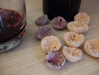 Ceramic pendants, organic, staining with wine, photograph by Kendra McCartney